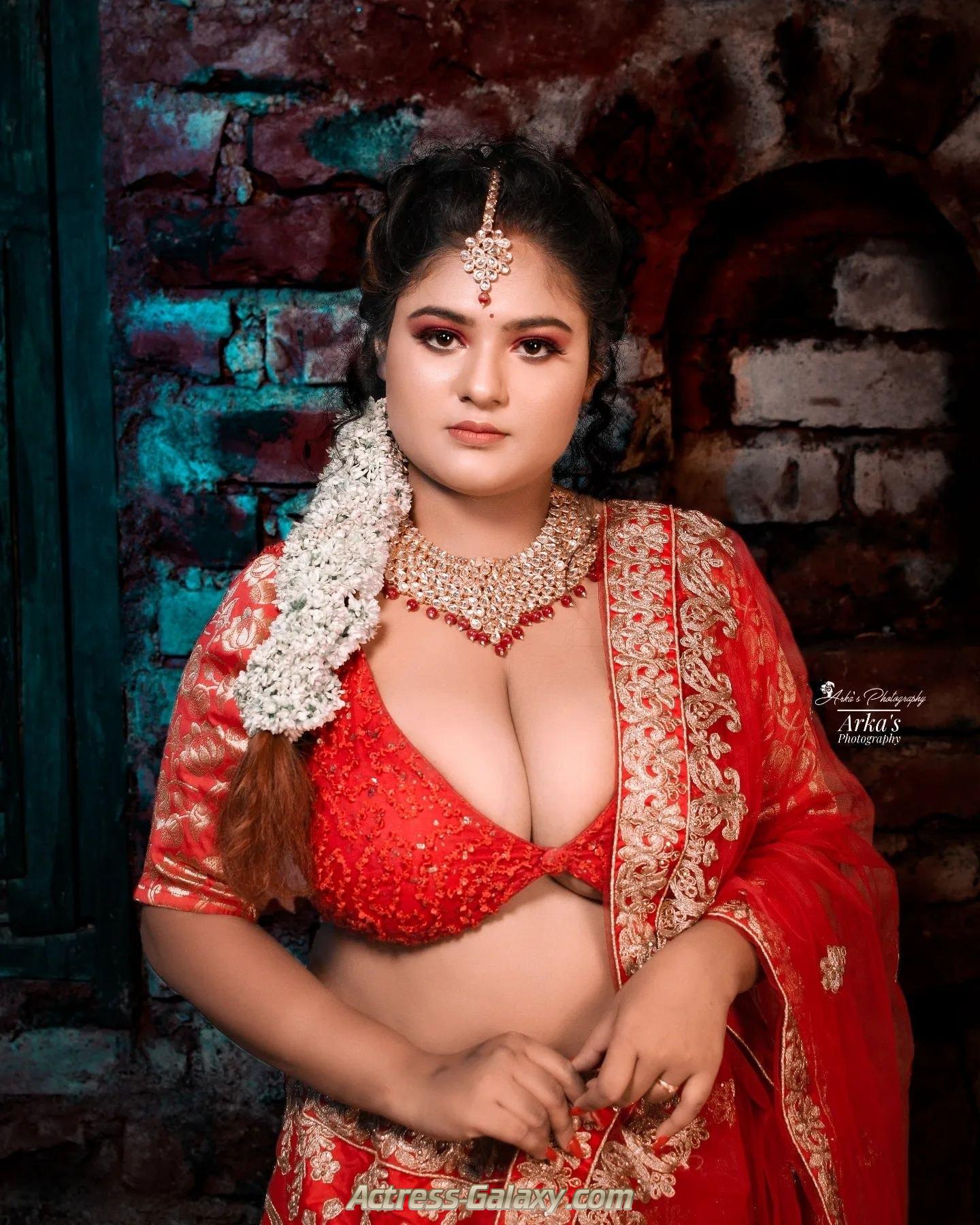 Megha Das Ghosh Sizzling Hot Photos In Red Lehenga